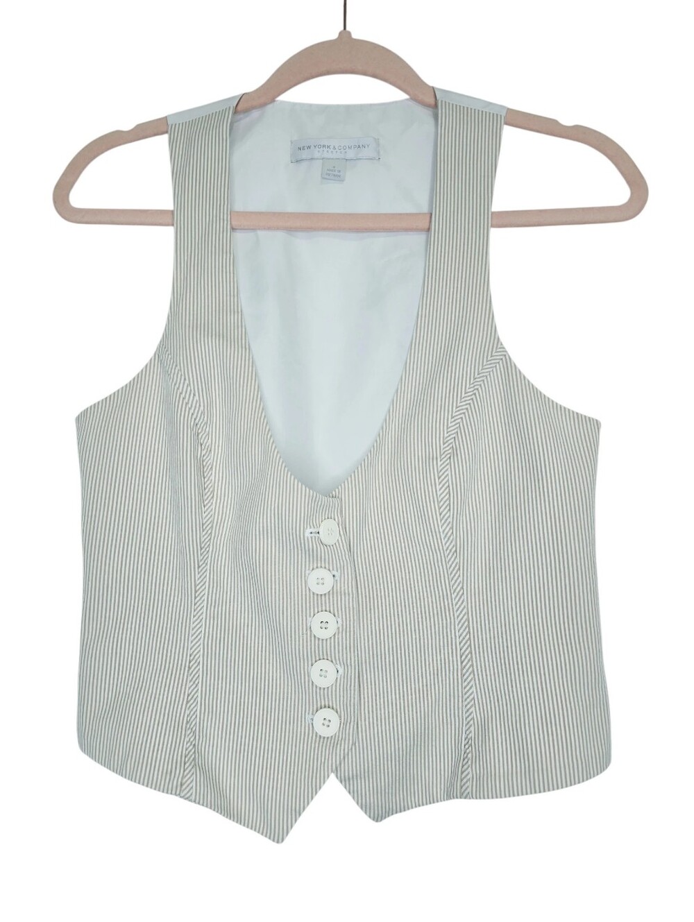NY&Co classic pinstripe vest with a tailored button-front design.